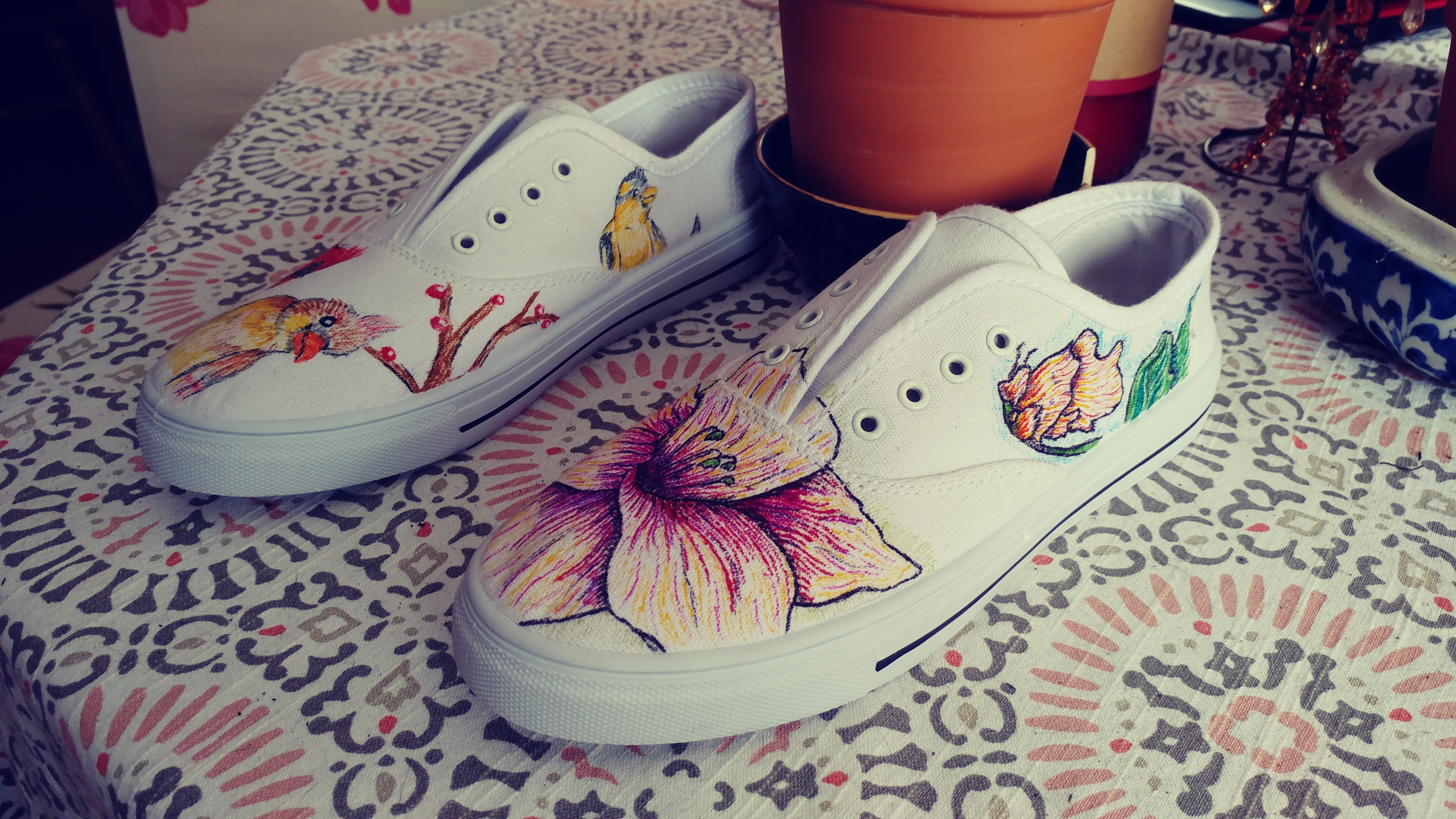 hand drawn shoes with flowers adn birds